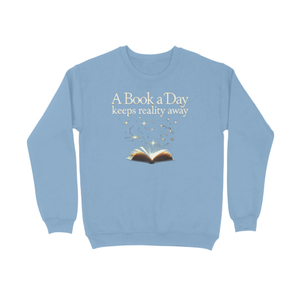 A Book A Day Unisex Sweatshirt in baby blue featuring quote “A Book A Day Keeps Reality Away,” cozy soft book lover sweatshirt for readers by Store Asmi