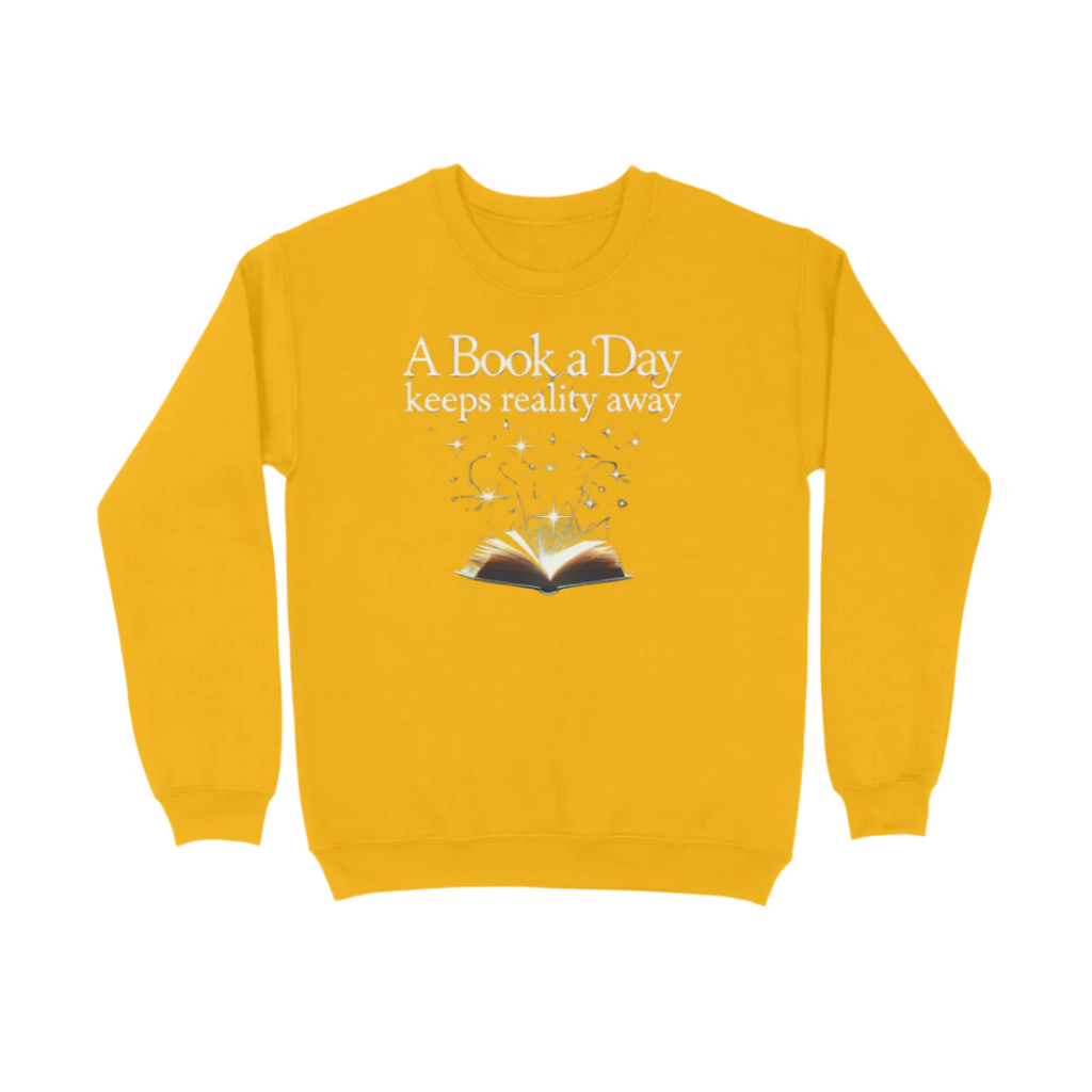 A Book A Day Unisex Sweatshirt in golden yellow featuring quote “A Book A Day Keeps Reality Away,” cozy soft book lover sweatshirt for readers by Store Asmi